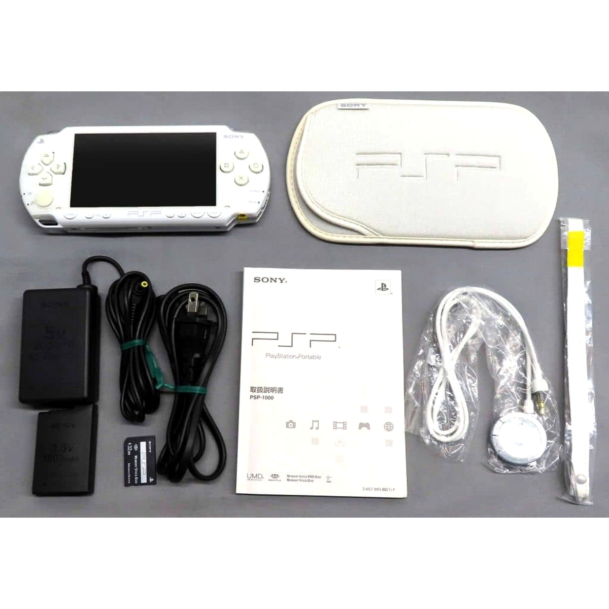 Sony PlayStation Portable Ceramic White Value Pack PSP-1000KCW Console with Box and Charger NTSC-J PlayStation Portable Series Console [USED]