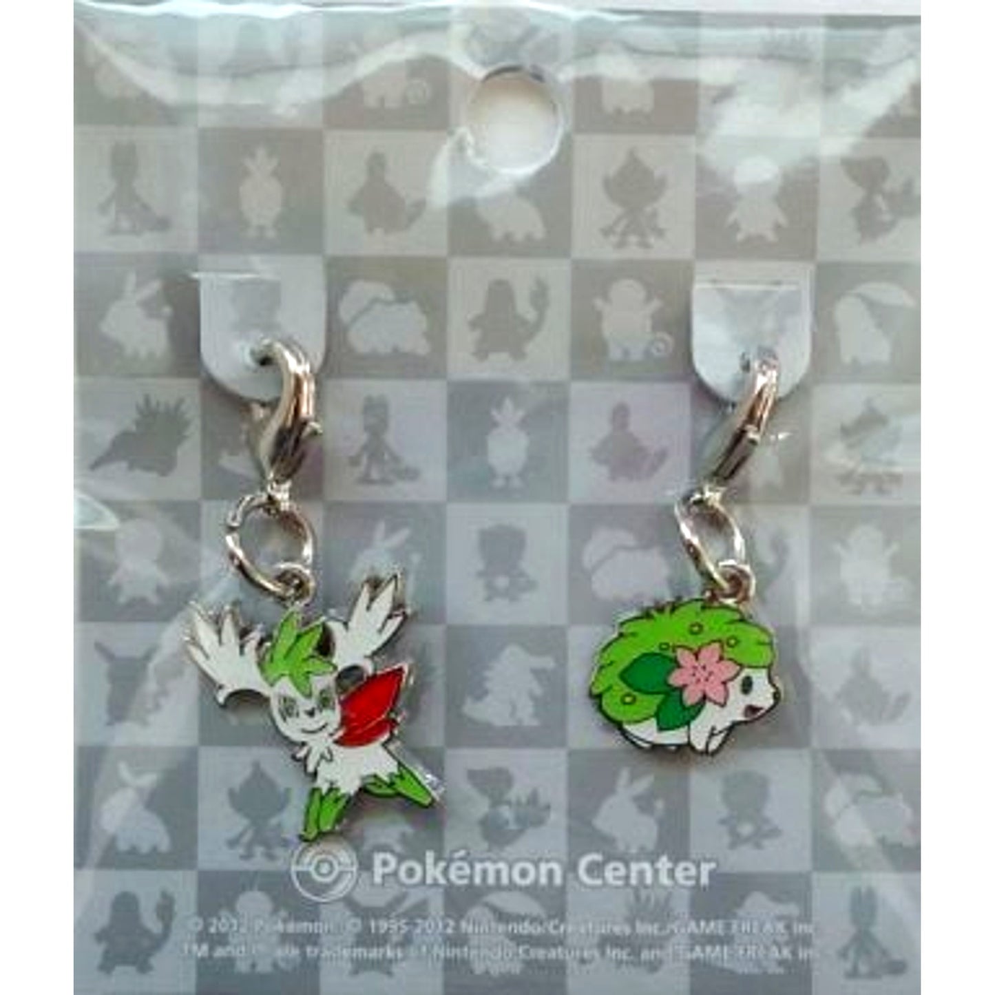 Set of 2 492 Shaymin Land Form & Sky Form Pokemon National Pokedex Metal Charm Pokemon Center Ltd [USED]