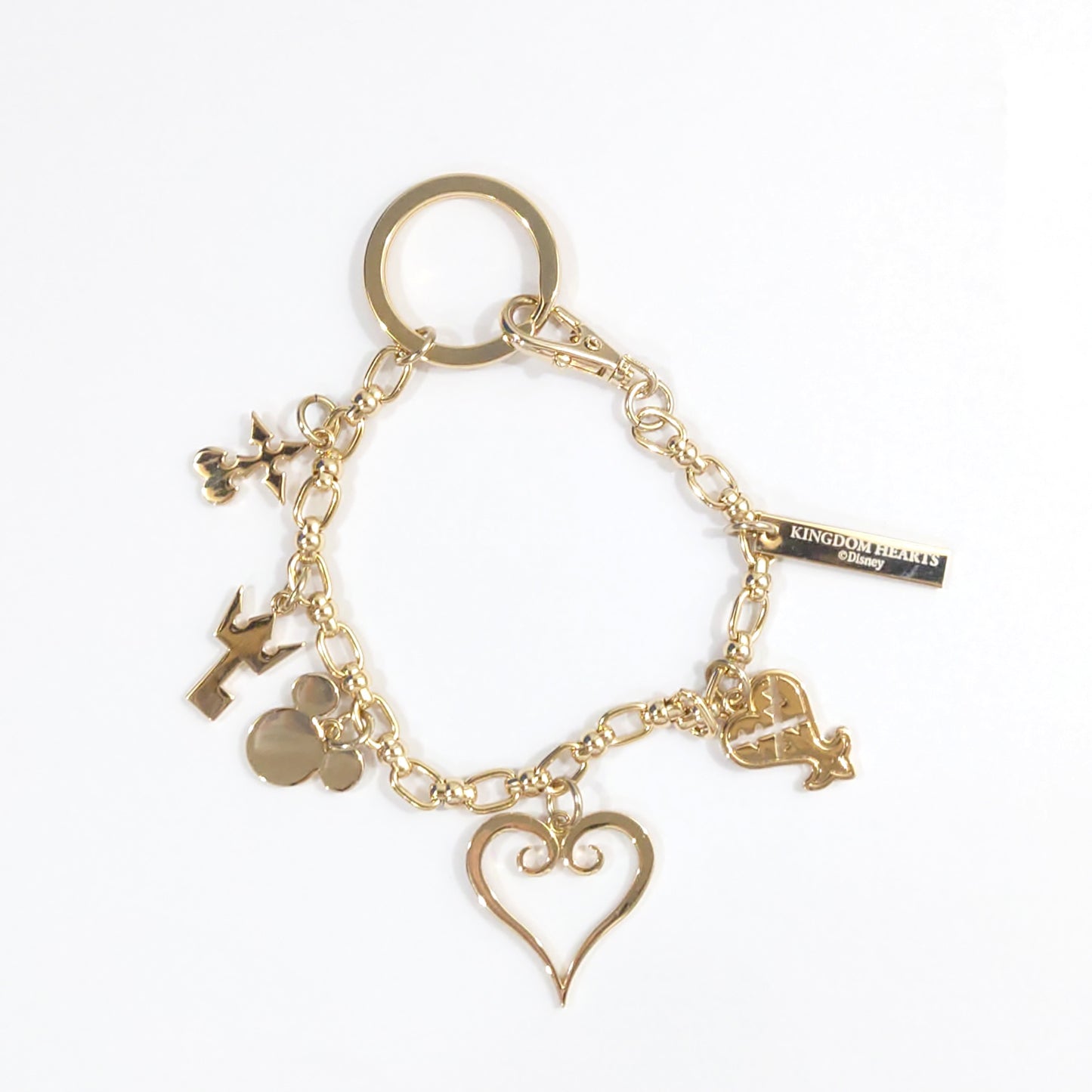 Kingdom Hearts III Monogram Gold Bag Charm SQUARE ENIX CAFE X ARTNIA Limited Keychains [USED]
