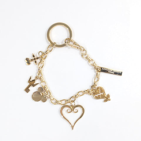 Kingdom Hearts III Monogram Gold Bag Charm SQUARE ENIX CAFE X ARTNIA Limited Keychains [USED] — photo 1
